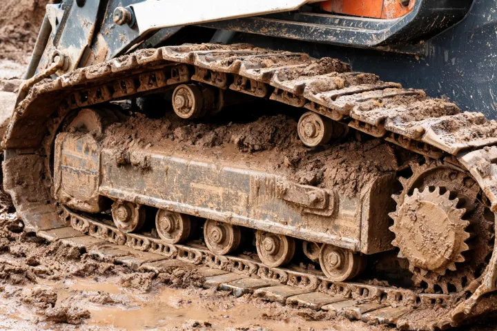 Compact track undercarriage close-up